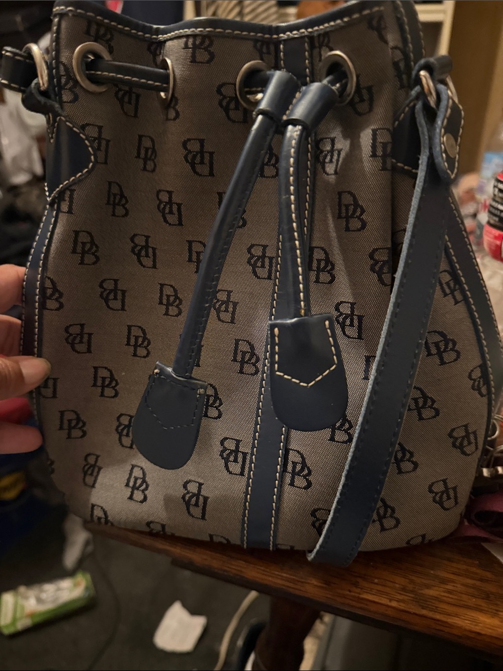 Dooney & Bourke Navy and Beige Monogram Drawstring Bucket Bag